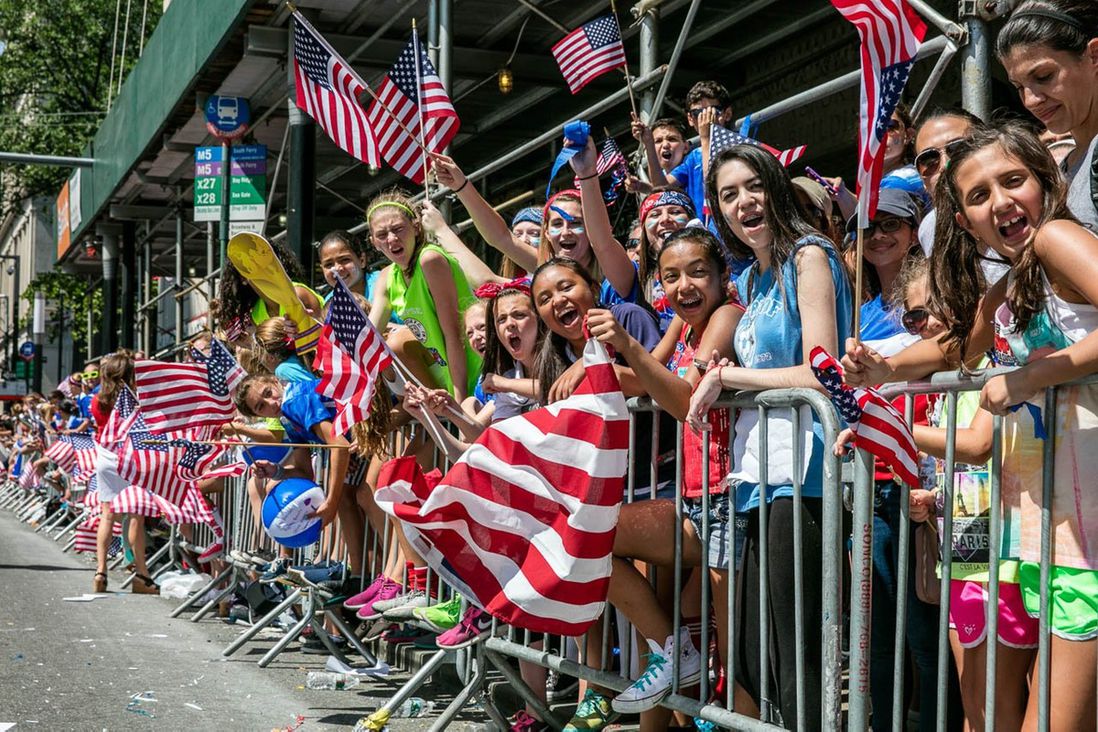 Fans line the street during the 2015 parade for the USWNT (Tod Seelie / Gothamist)